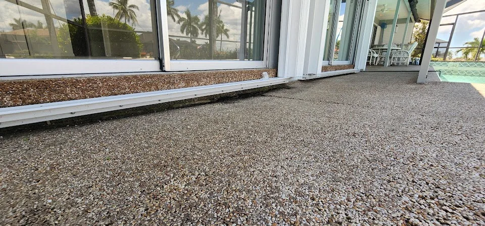 Settled pool deck concrete with loss of support beneath the slab