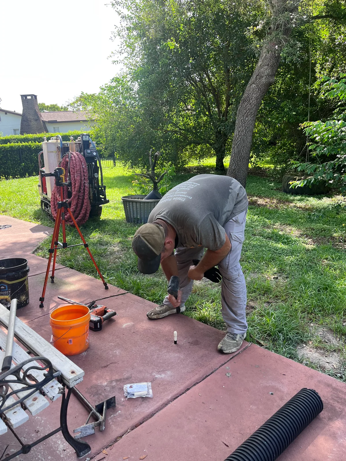 Drilling small injection holes for polyurethane concrete lifting