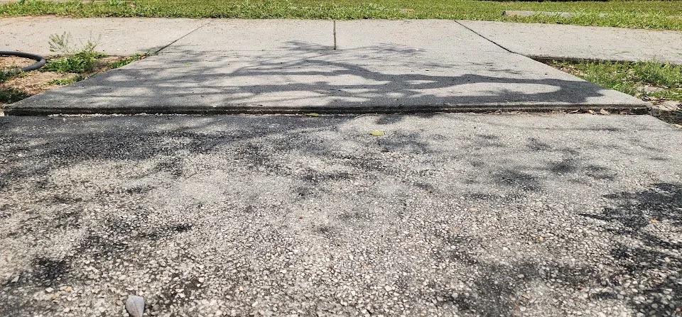 dade-city-sidewalk-concrete-lifting-leveling — before