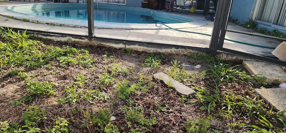 Cracked concrete slab caused by settlement and loss of support underneath