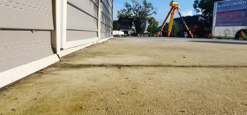 Environmental Foam Solutions concrete lifting equipment at a driveway repair project